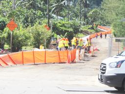 Red cones blocking access to the road under construction