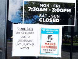 Sign of closed on front of ASNAP office