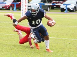 Samoana Sharks Toeaso Sola shakes off a defender