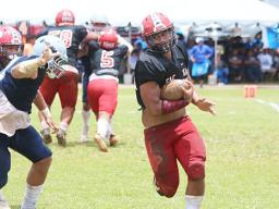 Mika Tavai (54) of the Vikings taking this reverse hand off play