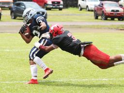 Kobe Lefiti crossing the goal line