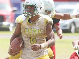 Joshua Taani of the Lions returning a kick off to midfield during