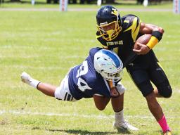  Samson Tupuola and was batted away by Sene Isileli Jr. during the opening half of their varsity match up last Saturday