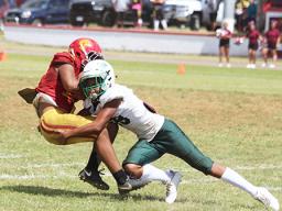 John Allen of Tafuna HS holding the ball
