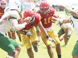 John Allen of the Warriors near the goal line 
