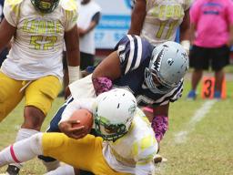 Tillus Sala (45) of the Sharks bringing down Fa’alili Fa’amoe 