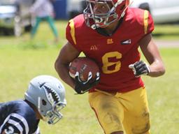 Isaiah Gurr of the Warriors with the ball at the sidelines