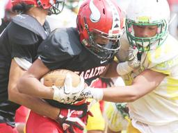 Faga’itua Vikings’ Scott Pese is stopped 