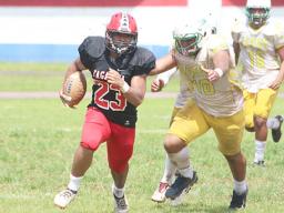 Fatu Fatu Jr. (23) of the Vikings taking this one all the way to