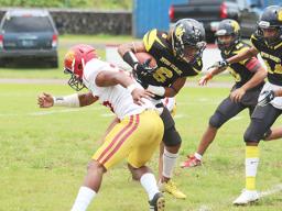 Justin Isileli (6) of the Nu’uuli Wildcats returning the opening kick-off