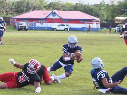 Johnson Talauega intercepting a pass from Fitu Amata of