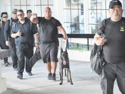 detectives of the DPS Vice & Narcotics / K-9 Units at the Pago Pago International Airport 