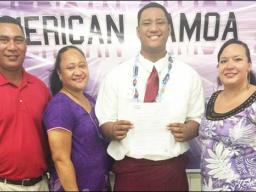 Frederick Mauigoa with family members after signing with Washington State