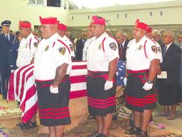 The Police Honor Guard escorting the United States flag-draped casket of the late Sen. Galeai Moaali’itele Tu’ufuli