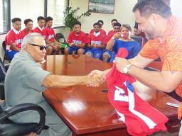 American Samoa Baseball Association president, Marcus Langkilde presented Gov. Lolo Matalasi Moliga with team jersey.