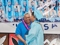GOV shakes hands with Kanana Fou graduate