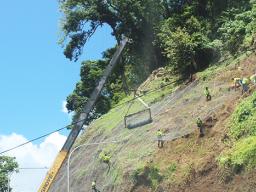 Workman on Mauga-O-Ali’i hillside