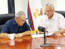 OIA Director Nikolao Pula with Governor Lolo Moliga