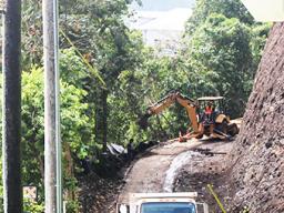 Road to Governor's Mansion with heavy equipment working to widen it.