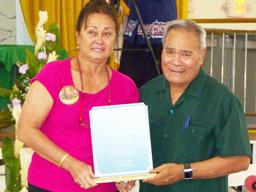 Lydia Faleafine-Nomura (left) and Gov. Lolo Matalasi Moliga (right) pose for a photo