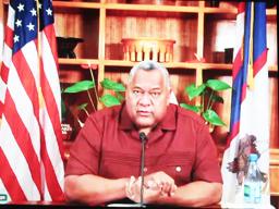 Gov. Lemanu Peleti Mauga at desk during virtual testimony