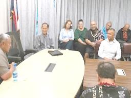 Matt Sumstine together with his wife Tricia with Governor Lemanu