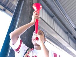 Nu'uuli VocTech graduate blowing horn