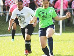 A Green Bay player controls the ball against Ilaoa & To’omata 