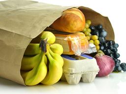Paper bag with groceries showing
