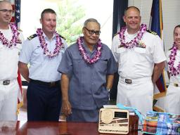Gov. Lolo Matalasi Moliga (center) with Commander Andy Strickland, Commanding Officer of the USS Shoup; two Naval officers and a US Coast Guard official