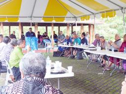 Port Administration director, Christopher King (at podium front) speaking to the gathering,
