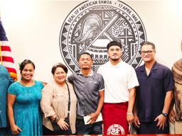 Gov and Lt Gov with student athletes and their families