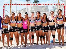 American Samoa's women’s beach handball team with their coaches