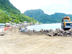 Happy Trucking constructing seawall in Futiga