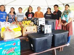 Many of the volunteers who put the care packages together