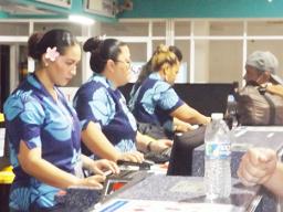 HAL staff checking in passengers