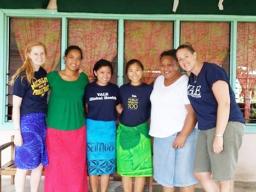 Nicola  Hawley and her former student Courtney Choy with others