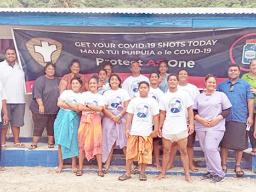 DOH Vaccination Team along with some of the village residents