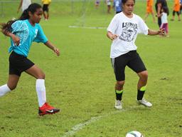 A Tafuna Jets player (left) and Ilaoa & To’omata opponent in action  