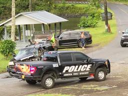 Wrecked truck involved in traffic accident with police cars