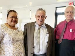 Mrs. Sinatagimaiava To, Sen. Alo Paul Stevenson, Uiagalelei Lealofi posed
