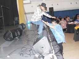 Mr. Cowboy — Sam Ah Chookoon and a fan 