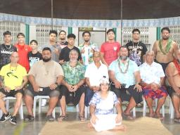 Coach Stanley Iakopo (seated far left), along with the visiting ASBF team (standing) and members of the Marist Samoa Sports Club