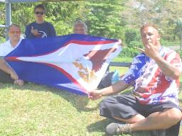 Supporters with Am Samoa flag