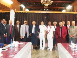 US Navy Command Master Chief Josephine Tauoa with her father and other Senators