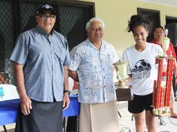 Pule Sagote (far right) of Ilaoa & To’omata receives the women’s 2018 FFAS National League trophy