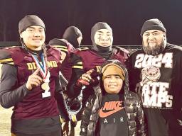 Lewis "Coach Saynt” Amituanai and family
