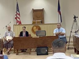 Malemo Tausaga (left) and Deputy Attorney General Roy Hall 