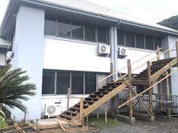 wooden stairway being built onto District Court building