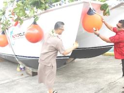 Lt. Governor La’apui christening the new DMWR vessel 